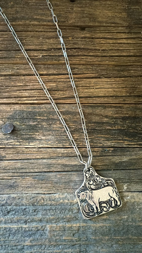 Tooled tag bull necklace