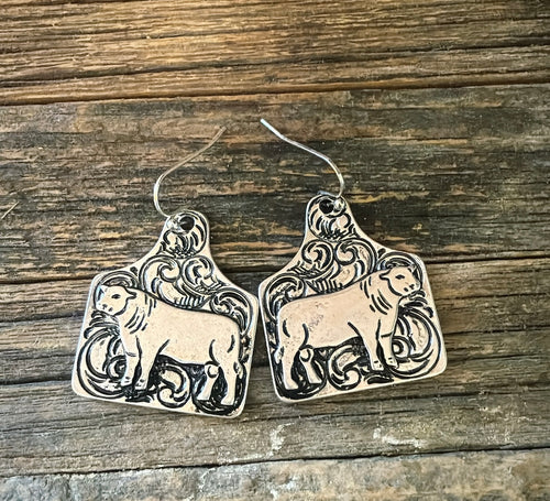 Tooled tag bull earrings