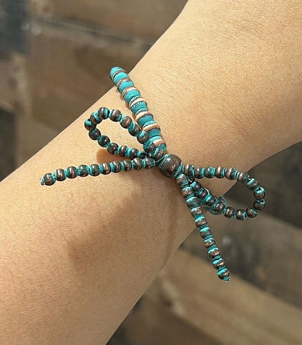 Navajo pearl bow bracelet- patina