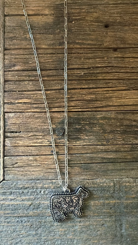 Tooled heifer necklace