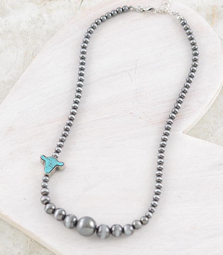 Turquoise cow Navajo necklace