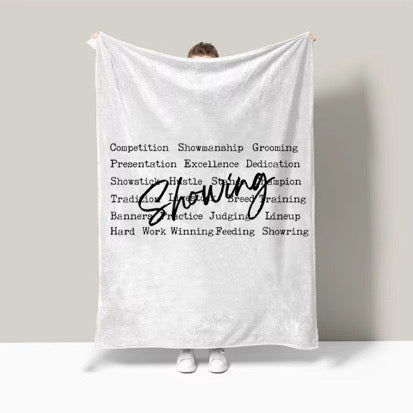 “Showing” light fleece blankets multiple sizes