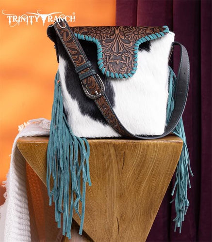 Hair on hide fringe shoulder bag